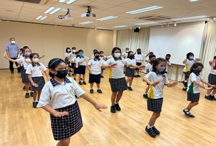 Students learning Malay Dance steps